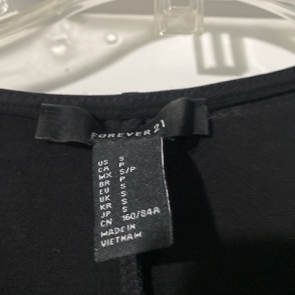 Black stretch mini dress with with twist front - Picture 2 of 3